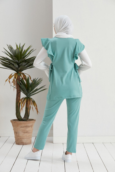Kol büzgülü belden Kuşaklı İkili Tesettür Takım Turkuaz Kol büzgülü belden Kuşaklı İkili Tesettür Takım Turkuaz