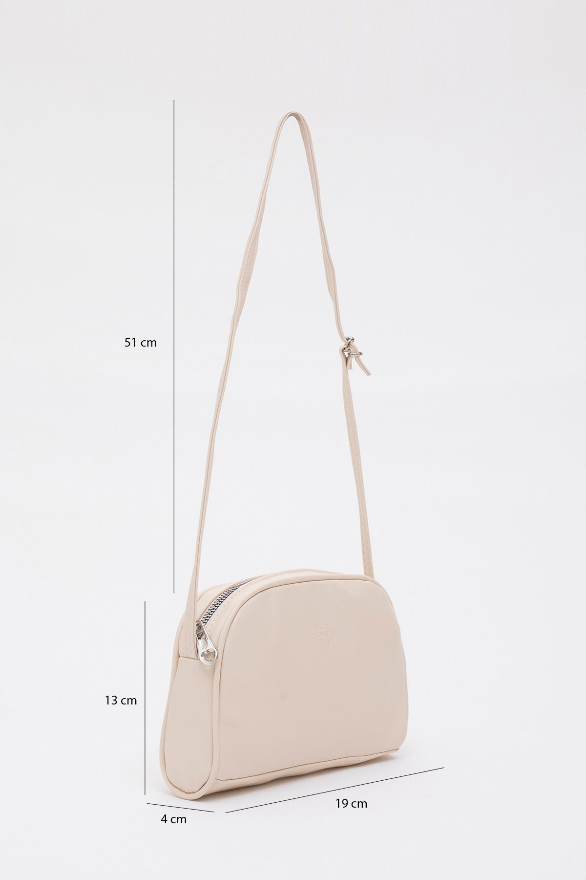 Krem Shk25 Mini Urban Çapraz Askılı Tek Bölmeli Suni Deri Kol ve Omuz Çantası U:19 E:13 G:4 cm Krem Shk25 Mini Urban Çapraz Askılı Tek Bölmeli Suni Deri Kol ve Omuz Çantası U:19 E:13 G:4 cm
