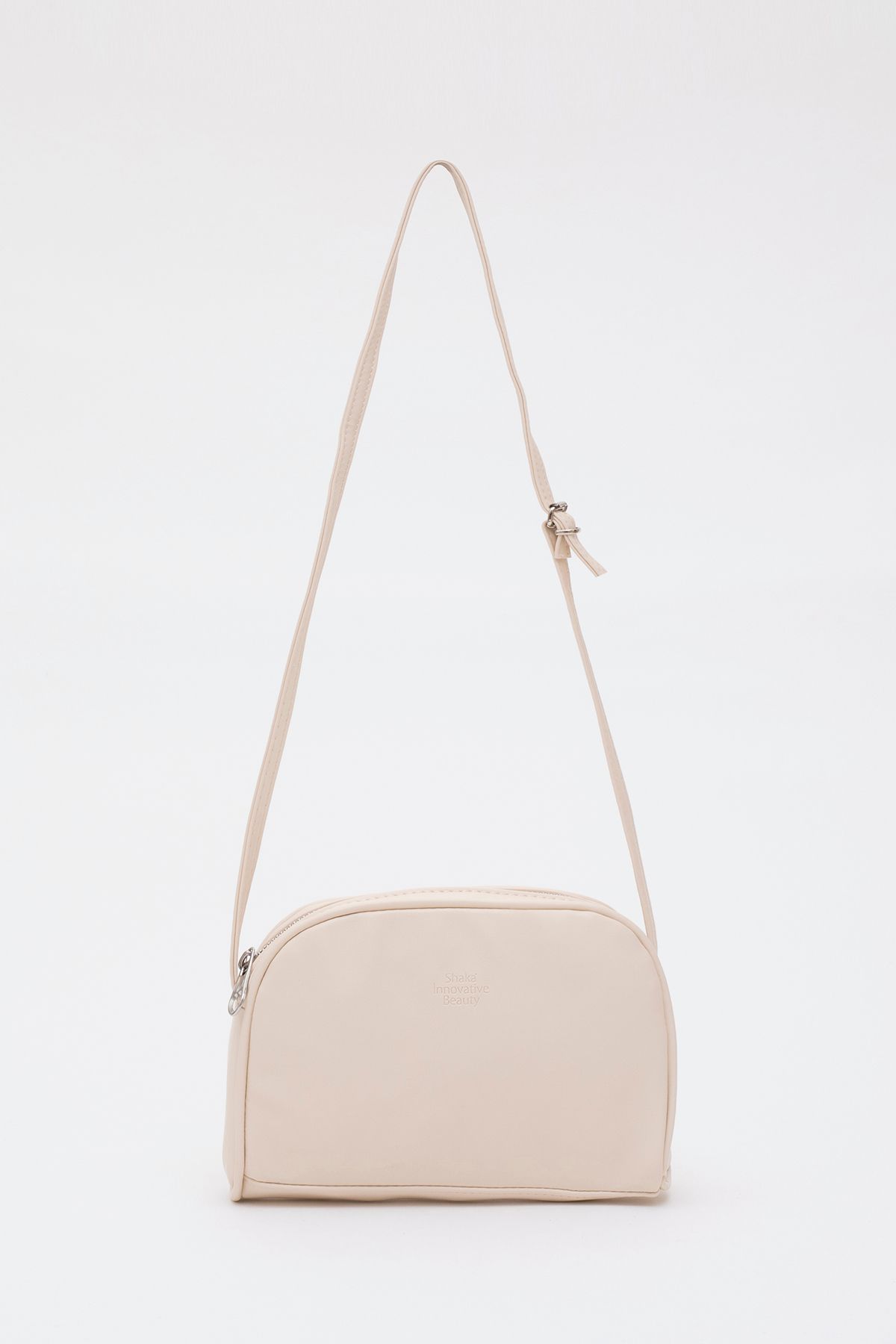 Krem Shk25 Mini Urban Çapraz Askılı Tek Bölmeli Suni Deri Kol ve Omuz Çantası U:19 E:13 G:4 cm Krem Shk25 Mini Urban Çapraz Askılı Tek Bölmeli Suni Deri Kol ve Omuz Çantası U:19 E:13 G:4 cm
