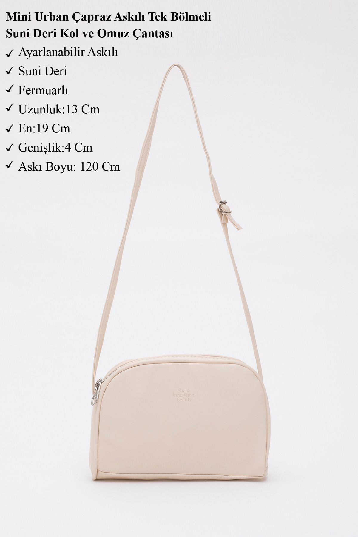 Krem Shk25 Mini Urban Çapraz Askılı Tek Bölmeli Suni Deri Kol ve Omuz Çantası U:19 E:13 G:4 cm Krem Shk25 Mini Urban Çapraz Askılı Tek Bölmeli Suni Deri Kol ve Omuz Çantası U:19 E:13 G:4 cm