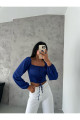 Kadın Saks Balon Kol Bağlamalı Korse Görünümlü Madonna Yaka Dalgıç Kumaş Crop Bluz Kadın Saks Balon Kol Bağlamalı Korse Görünümlü Madonna Yaka Dalgıç Kumaş Crop Bluz