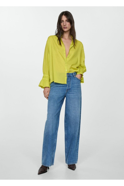 Kolları büzgülü gömlek Kolları büzgülü gömlek