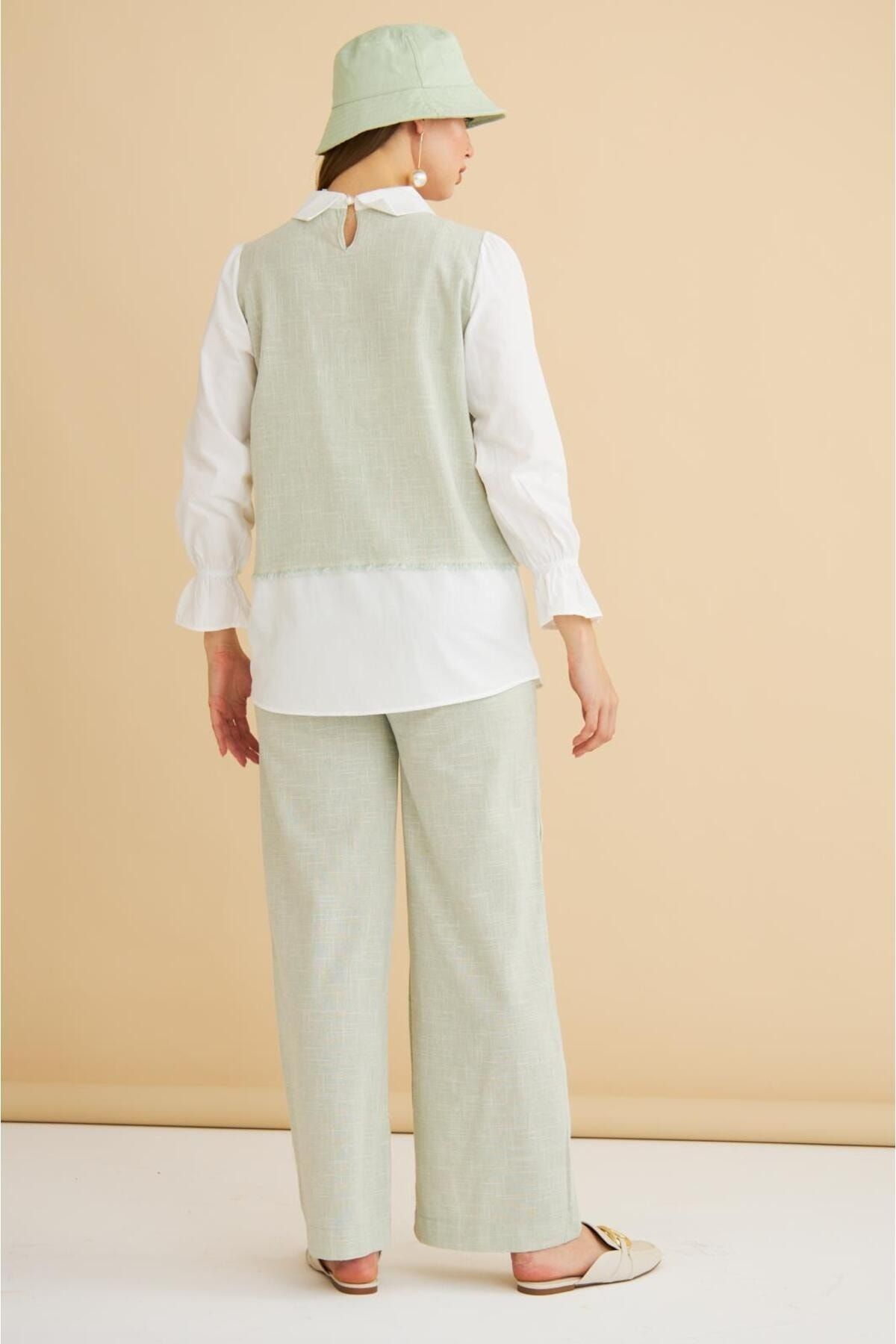 Lambade Düğme Detaylı Bol Paça Keten Mint Tunik Pantolon Takım Lambade Düğme Detaylı Bol Paça Keten Mint Tunik Pantolon Takım