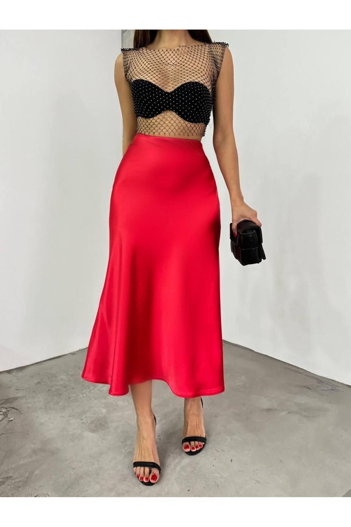 Kadın Saten Yüzeyli Beli Lastikli Midi Boy Etek Kadın Saten Yüzeyli Beli Lastikli Midi Boy Etek
