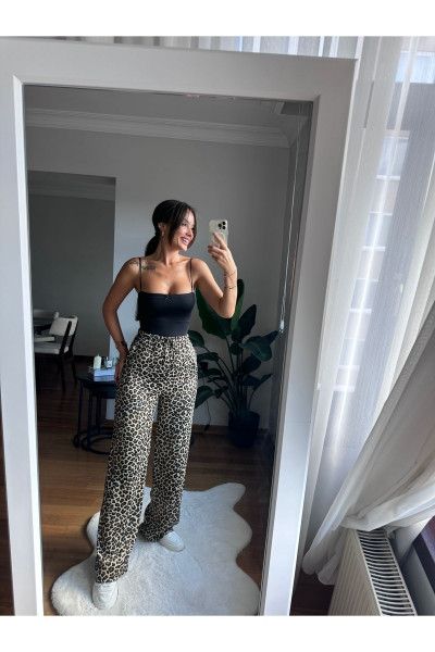 Kadın saten leoparlı pantolon Kadın saten leoparlı pantolon