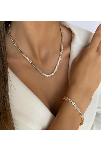 Su Yolu Gold Baget Taşlı Dolgun Çelik Kolye Su Yolu Gold Baget Taşlı Dolgun Çelik Kolye