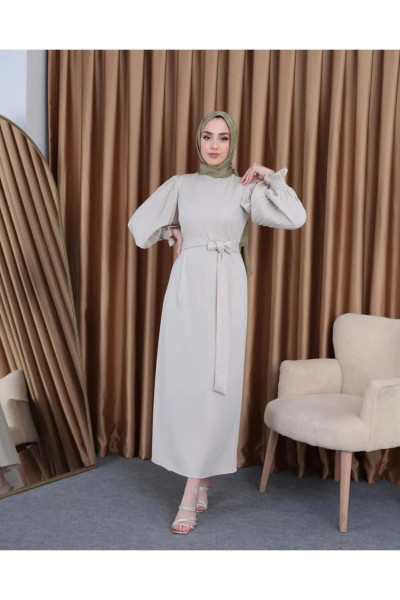 Kolu pliseli kemer detaylı tesettür elbise Kolu pliseli kemer detaylı tesettür elbise
