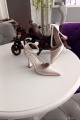 Ten Saten Üç Sıra Taşlı 11cm Şampanya Topuklu Bileği Kemerli Abiye Stiletto Kadın Ayakkabı Ten Saten Üç Sıra Taşlı 11cm Şampanya Topuklu Bileği Kemerli Abiye Stiletto Kadın Ayakkabı
